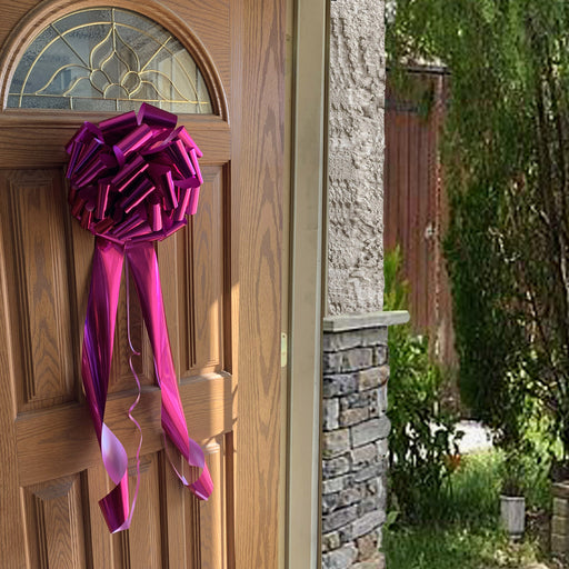 metallic fuchsia hot pink bow as a door decoration