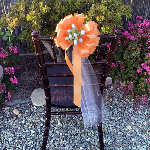 peach-tulle-pew-bows-with-flowers