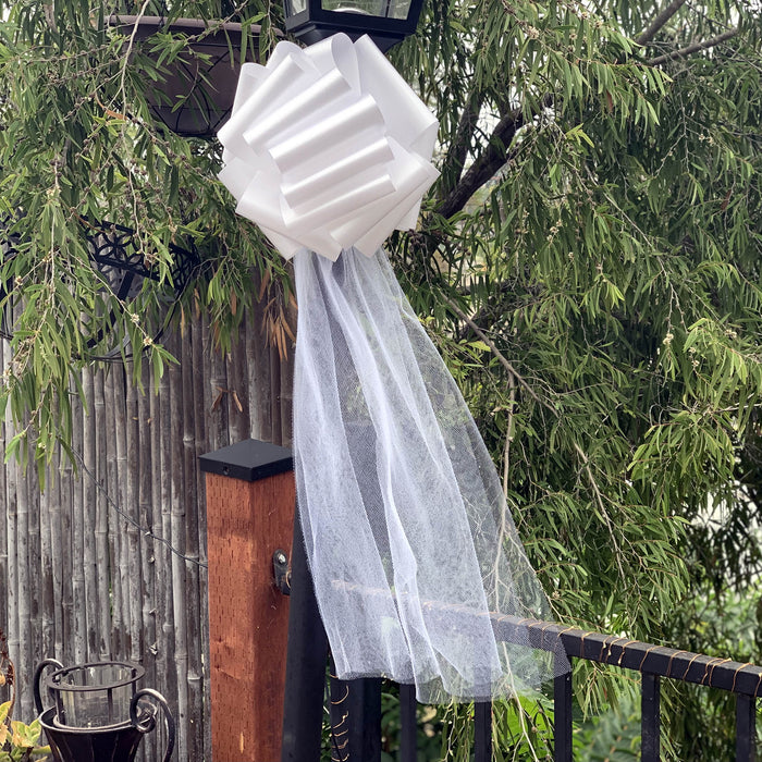 decorate posts with budget friendly ribbonbows and tulle