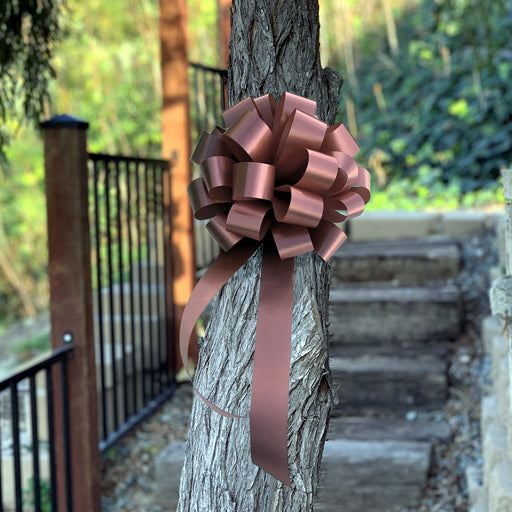 brown pull bows for garden wedding