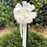 posts decorated with elegant ivory bows