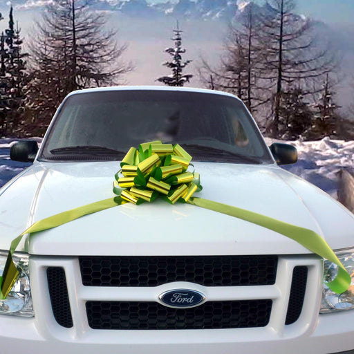 large shiny citrus green bow adorning a car  surrounded with a majestic winter scenery