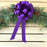 purple pull bows on a Christmas swag