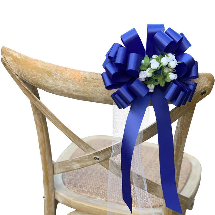 royal-blue-wedding-bows-with-white-rosebuds