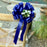 royal-blue-wedding-bows-with-tulle-tails-and-rosebuds