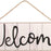 white-wooden-welcome-sign