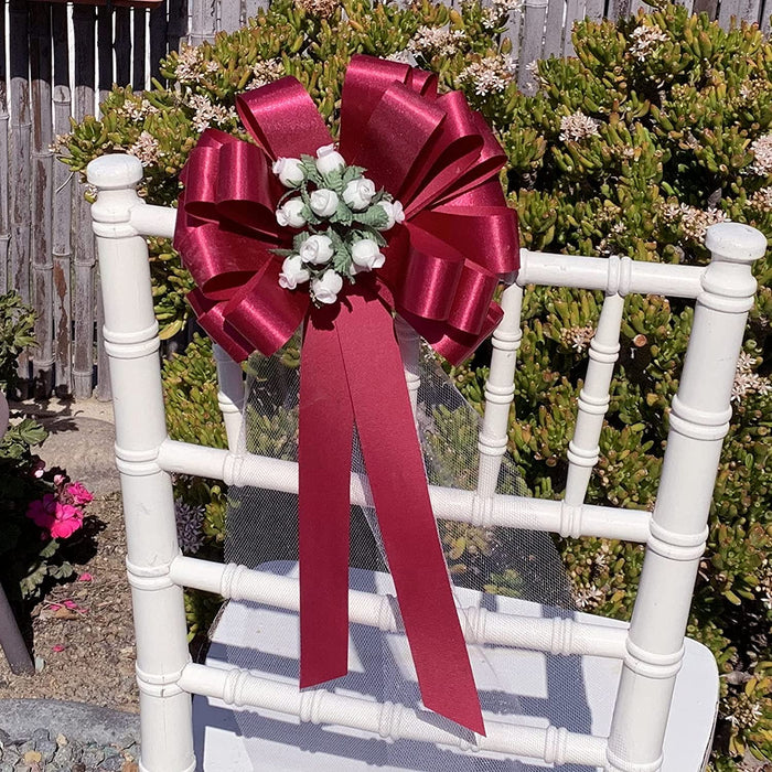 hot-pink-wedding-bows-with-white-rosebuds