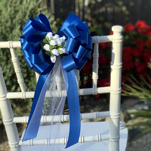santorini-blue-pew-bows-with flowers