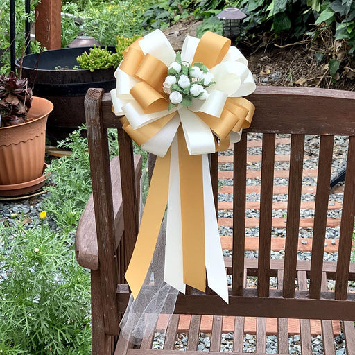 gold-ivory-pew-bows-with-flowers