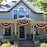 classic red white and blue buntings adorning  quintessential souther porch