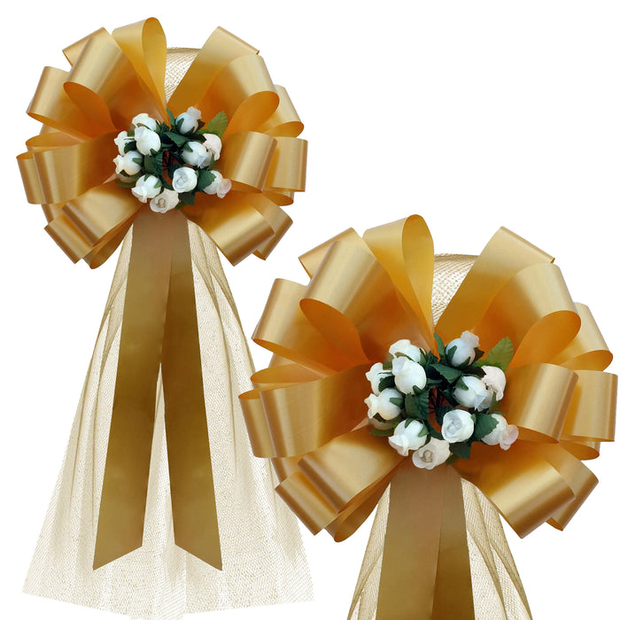 gold-wedding-bows-with-white-rosebuds-and-tulle-tails