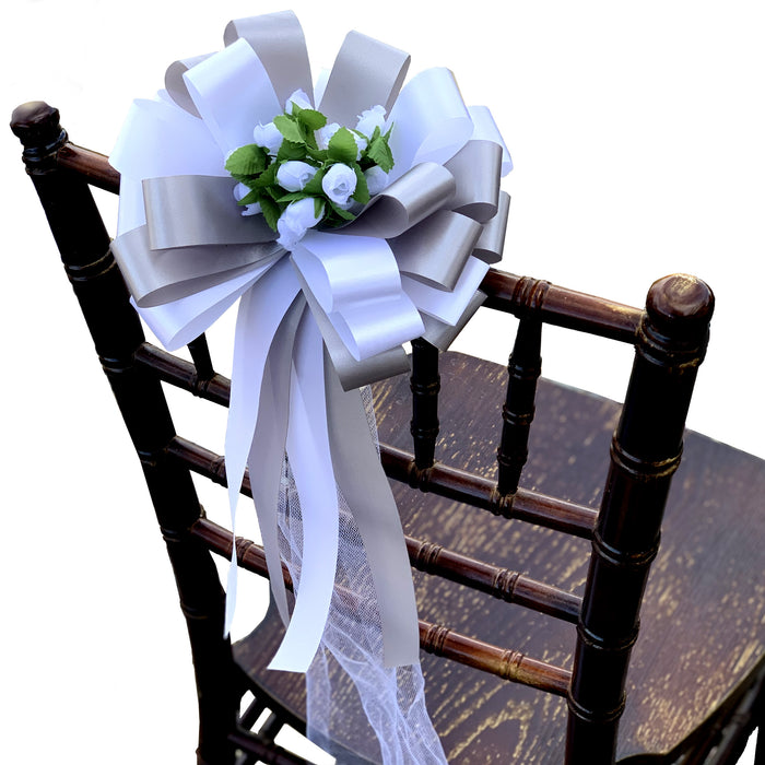 white-silver-wedding-pew-bows-with-flowers