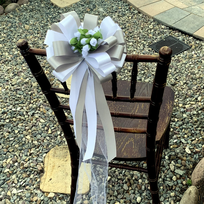 white-silver-tulle-roses-chair-bows